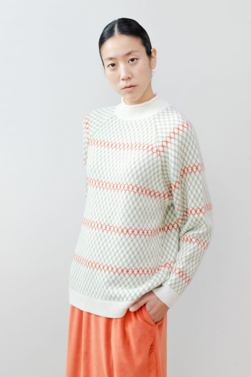 Jersey geométrico cuello alto