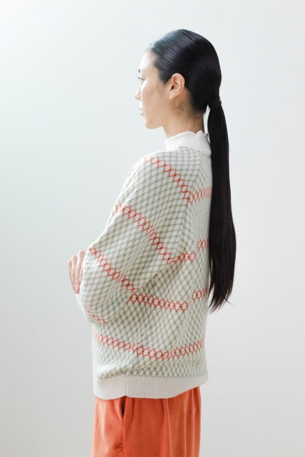 Jersey geométrico cuello alto