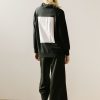 Sudadera negra cuello alto