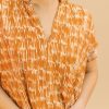 Blusa fluida estampado teja