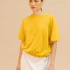 Top con goma amarillo mostaza