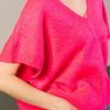 Chaleco fucsia cuello pico