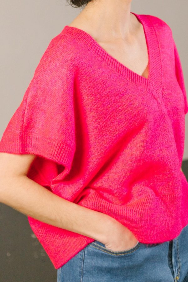 Chaleco fucsia cuello pico